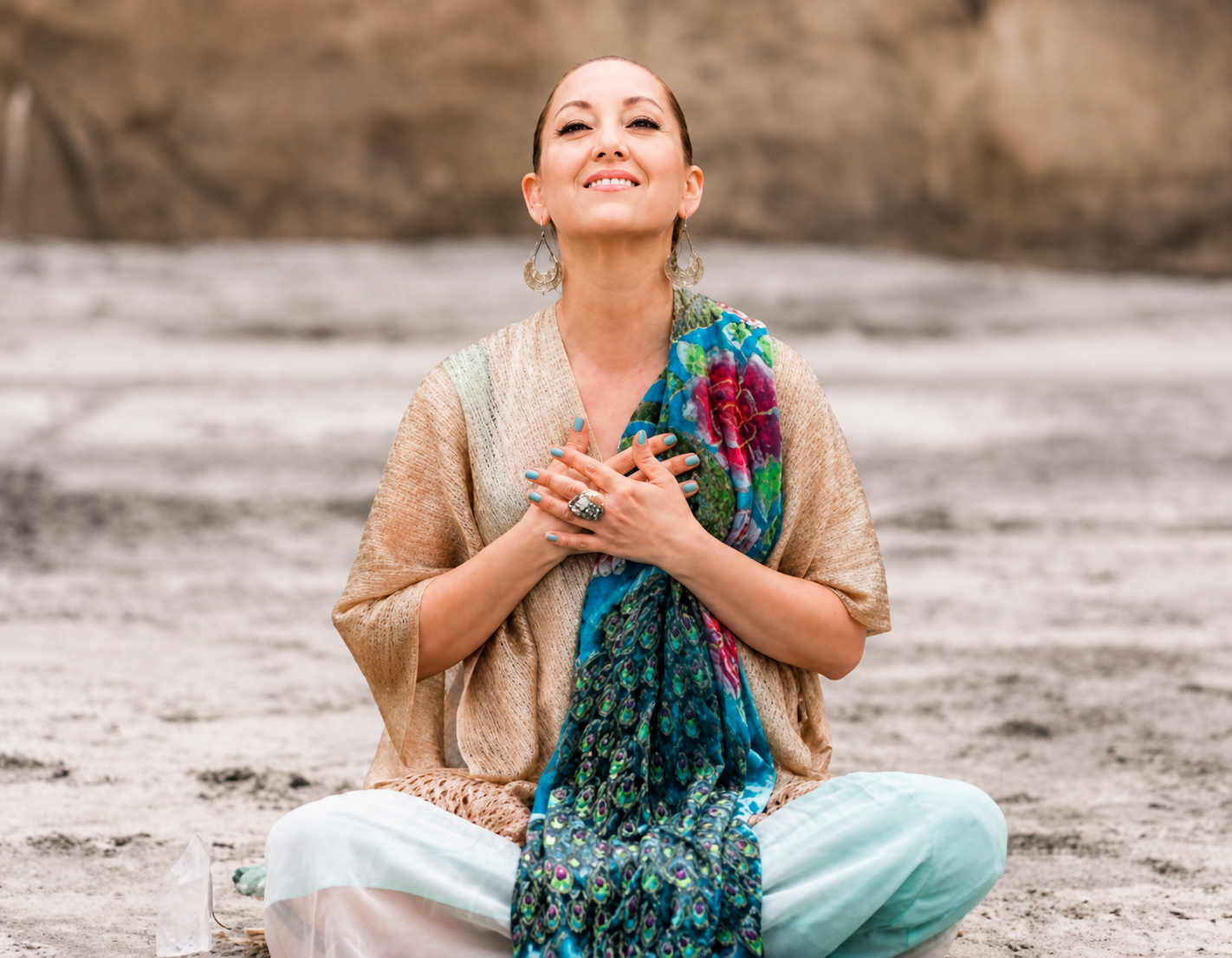 Isha Gold — hands over heart